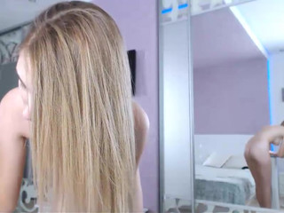 PassioNina  Red-haired bitch jerks off pussy with sex toy