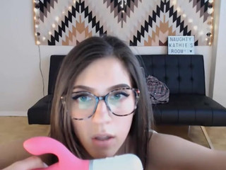 Naughtykathie  Lustful bitch demonstrates shaved holes