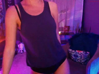 posie Naughty female caresses shaved cunt