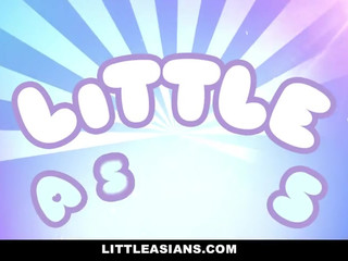 LittleAsians skinny female rubs herself with oil