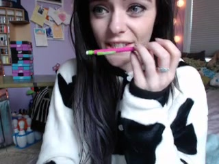 Ashe Maree black haired sucking a dildo