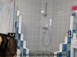 NellieCute curious prostitute sucking rubber dick