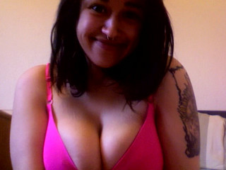 kezia420 playful woman caresses shaved pussy