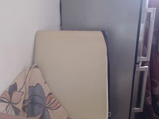 Femiii black-haired lady caresses boobs