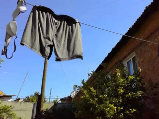 orange girl1 plump bitch creases her boobs