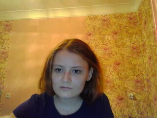 Orange girl1 fun with a toy