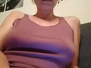 Amelie7 busty babe masturbates shaved cunt