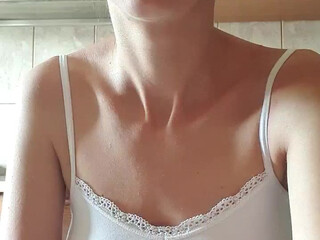 Julyasweetpussy busty  cam girl  caresses her lips.