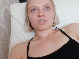 Kura the chick measures beautiful outfits.