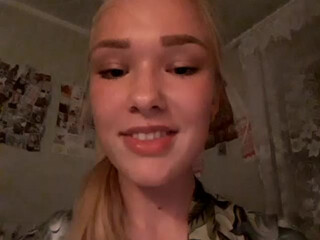 MissSunOh red-haired slut strips and pussy pulls