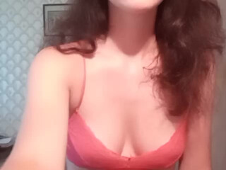 Tigirs13 sexy nymph excites with delicious tits