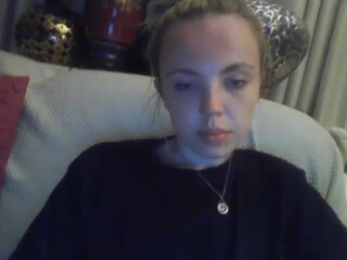 yourbabylynn23 chaturbate black-haired young lady in stockings masturbates her shaved pussy