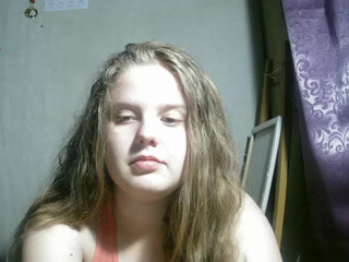 alicepussy lustful babe caresses shaved pussy