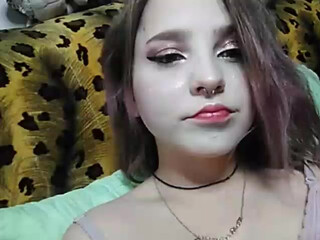 DeloraFade busty chick masturbates shaved pussy