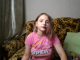 DeloraFade having fun with a toy