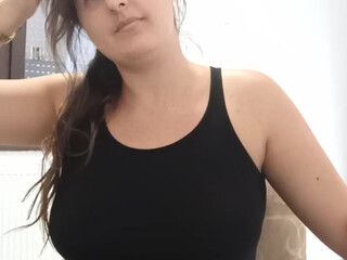 foxxxy gold busty cam girl undresses and caresses her pussy