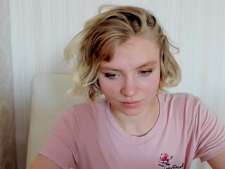 Kura undresses in front of the camera