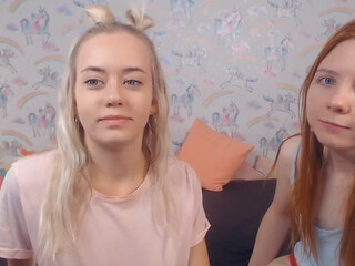 MartinaEvie cute lady caresses shaved cunt