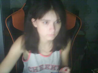 Mila18777 fucks herself with black dildo