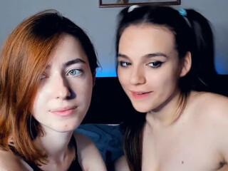 VienaNelsa amazing female caresses shaved pussy