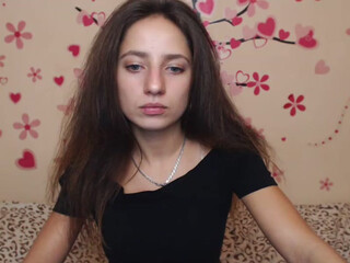 Beauty Adele cute girl caresses her charms