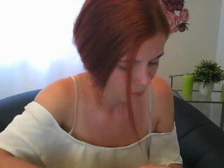 DelicAdore red-haired bitch excites beautiful legs