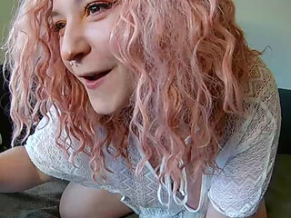 KittyXLDoggo openwork blonde erotically moving in front of the camera