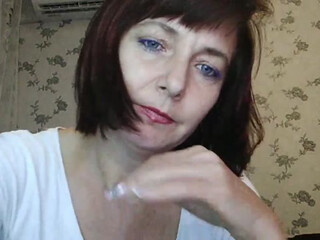 KoshkaKissES cute lady caresses shaved cunt