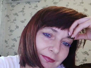 KoshkaKissES charming babe caresses tits