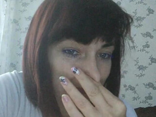 KoshkaKissES delightful beauty fucks a shaved vagina