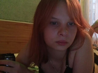 Laura-Foxy gorgeous brunette girl passionately sucks dildo