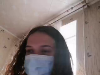 Moonlalii charming girl strips in front of the camera