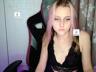 Unikaa dark haired prostitute caresses big tits