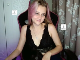 Unikaa fucks herself with black dildo