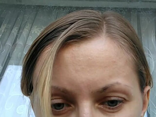 Zarevna naughty nipple performs a light striptease