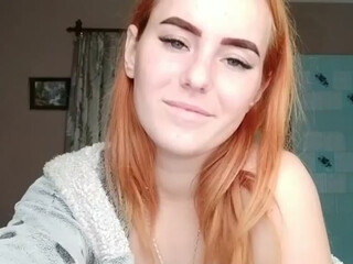 ChandlerSout webcam show blonde with tattoo caresses huge boobs