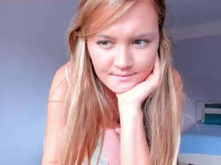 FIRE ICE EMMA webcam show red-haired schoolgirl caresses shaved cunt