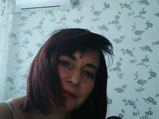 KoshkaKissES webcam show fucks herself in red dildo