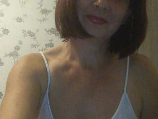 KoshkaKissES webcam show busty chick shows her charms