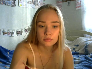 MissSunOh webcam show lustful mare caresses boobs