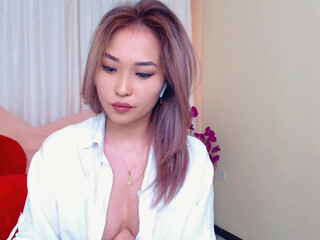 anniekawai puts on bra bitch