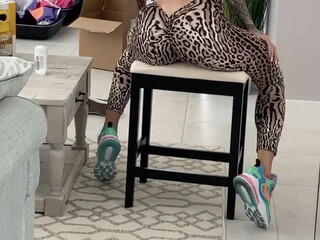 bakhar chick fucks herself with a big rubber dildo