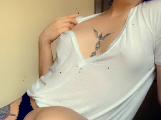 lil black haired bitch shows her boobs