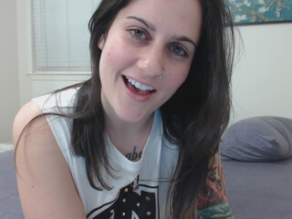 Erin Marie O'Keefe aka Goddess Green Eyed shows off her milking