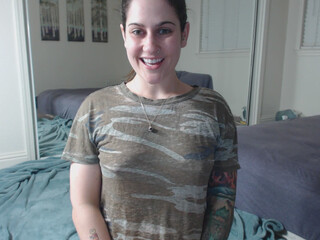 Erin Marie O'Keefe aka Goddess Green Eyed busty lady posing in fr