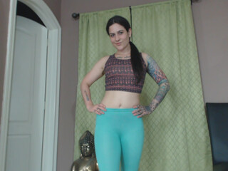 Erin Marie O'Keefe aka Goddess Green Eyed with a toy in the pussy