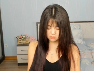 fronsa shy babe shows her natural tits