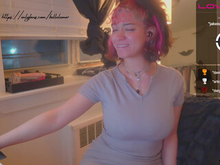 bellelemer pretty woman sitting in a chair