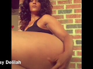 Bossy Delilah  pounding her pussy with a big dildo