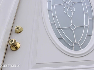 GoddessTKelly openwork blonde erotically moving in front of the camera